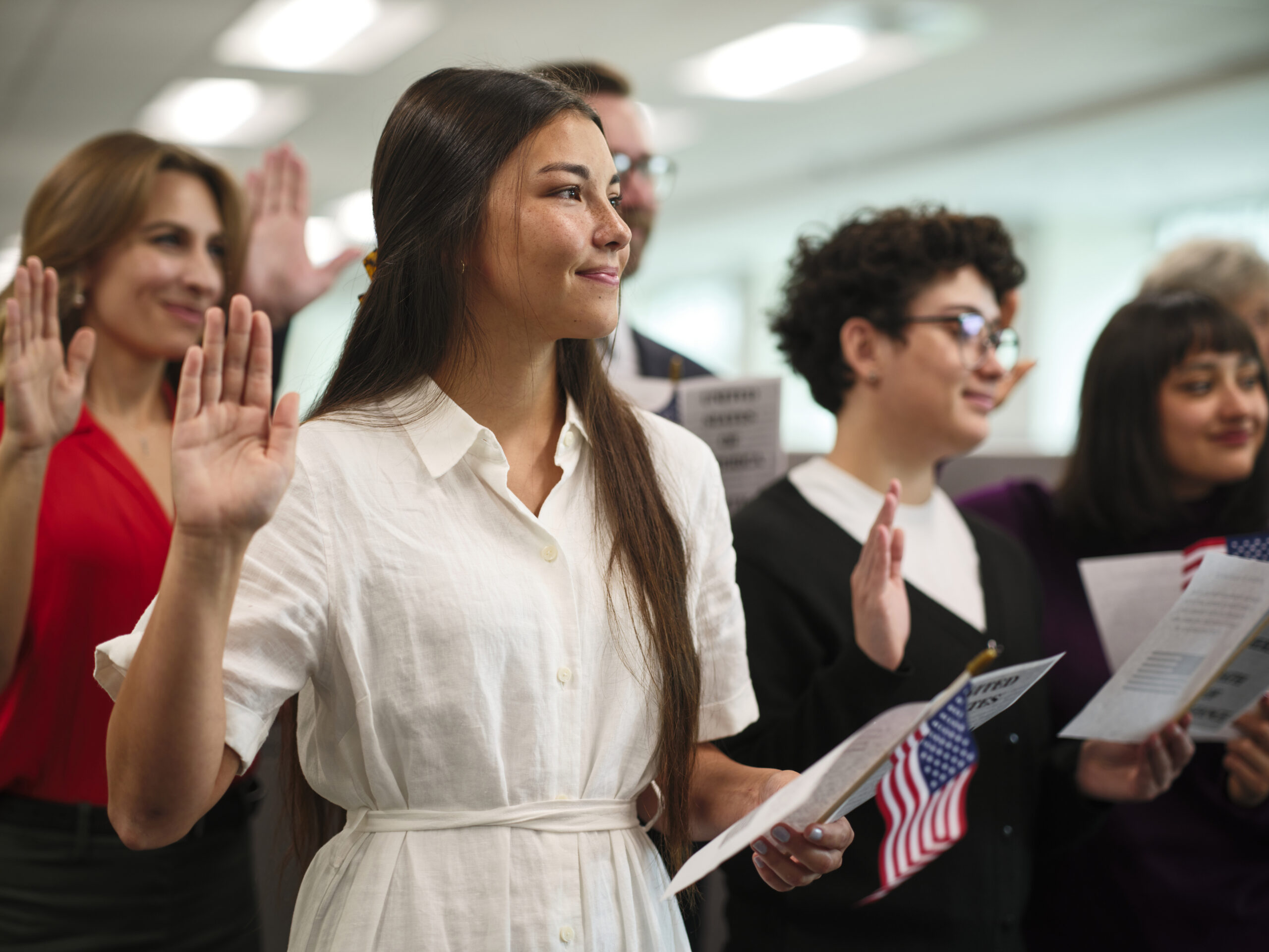 New U.S. citizens taking the Oath of Allegiance at a naturalization ceremony